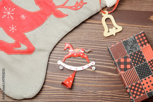 Fotografie Christmas gift box, food decor and christmas decorations on a dark wooden background