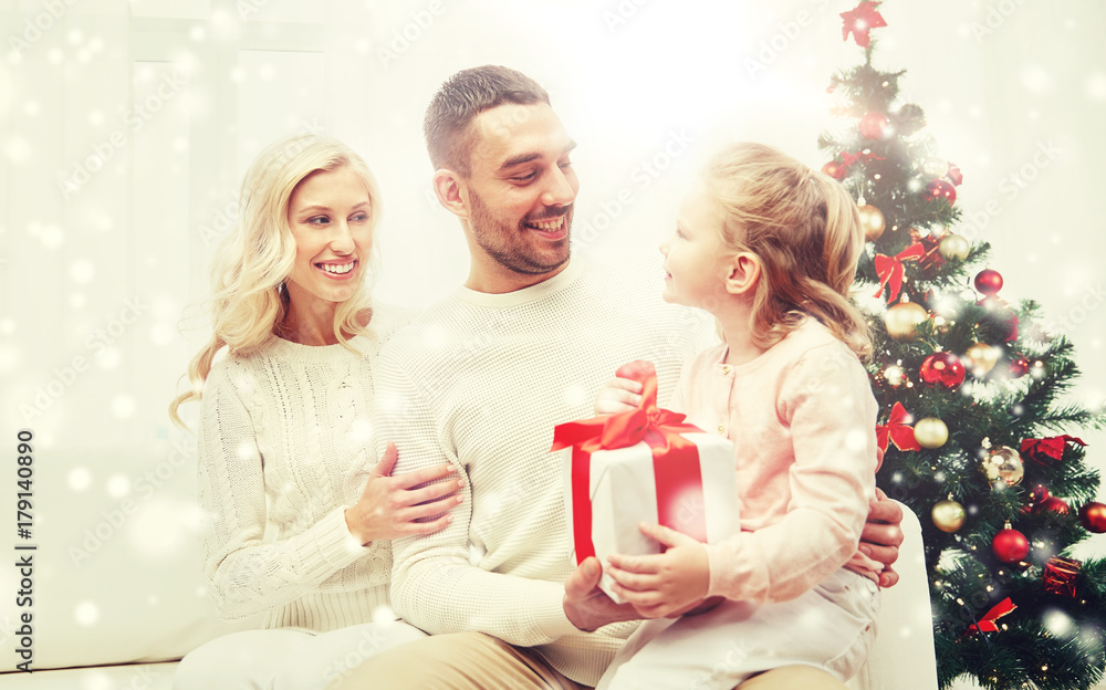 happy family at home with christmas gift happy family at home with christmas gift