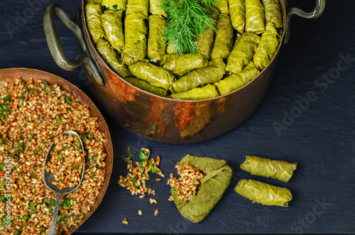 Middle-Eastern Food, Arabian cuisine, Stuffed vine leaves, or traditional Dolma.Top view, close up.