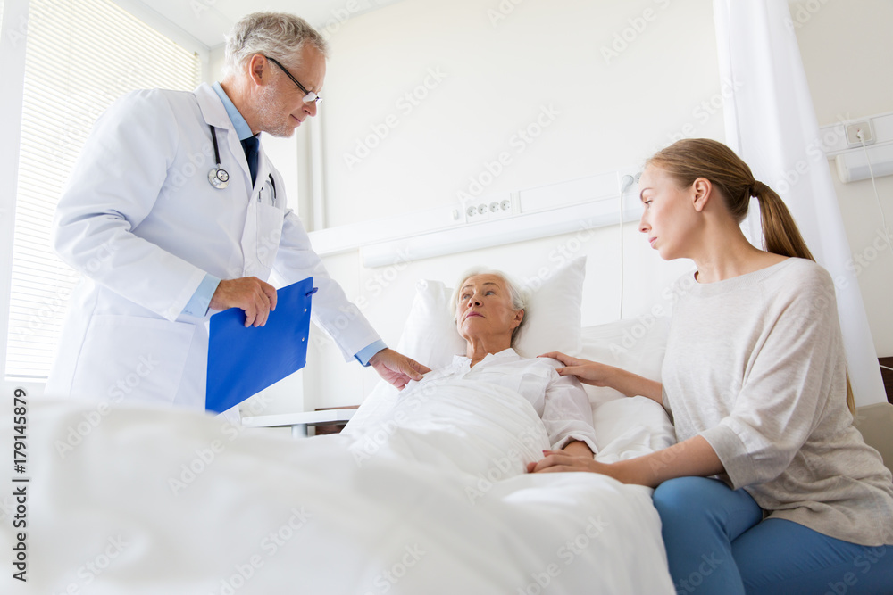 senior woman and doctor with clipboard at hospital senior woman and doctor with clipboard at hospital