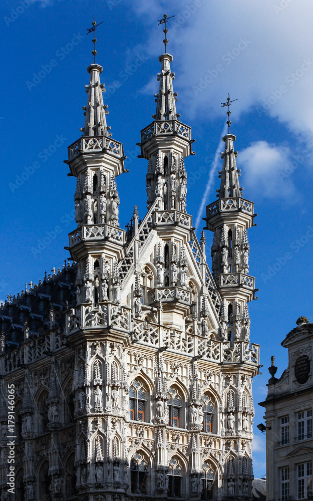 Fragment of The Town Hall's facade in Leuven, Belgium. Town (City) Hall is a landmark building on that city's Grote Markt square, built in a Brabantine Late Gothic style between 1448 and 1469