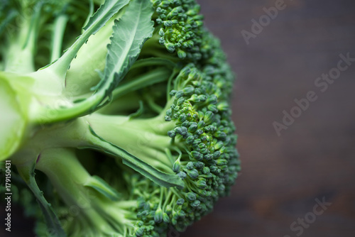 Fresh broccoli on the wooden table, closeup