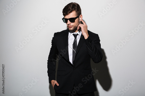Portrait of a serious concentrated man in suit © Drobot Dean