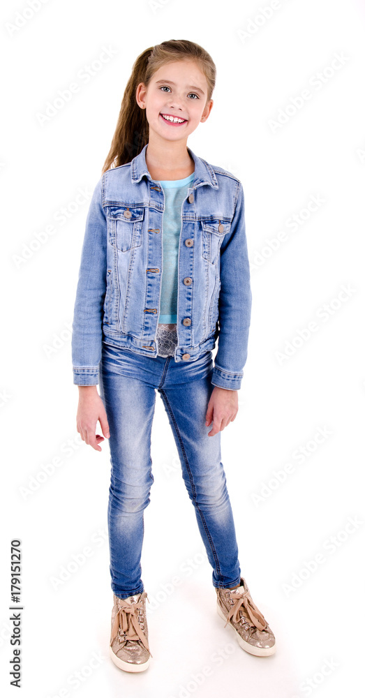 Fototapeta premium Portrait of adorable smiling happy little girl child isolated