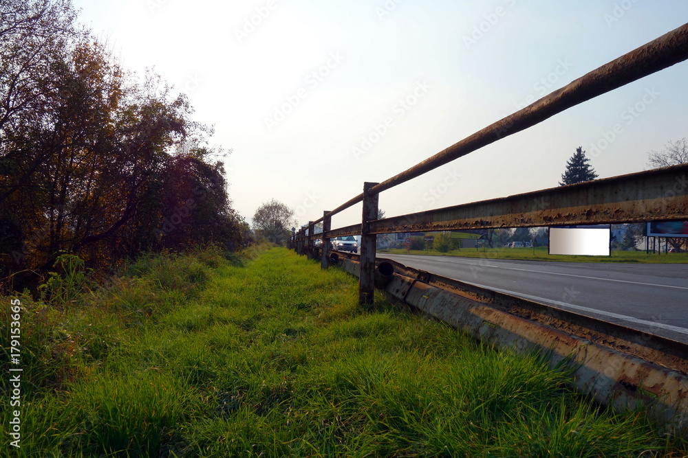 Fototapeta premium Damaged guardrail on the way
