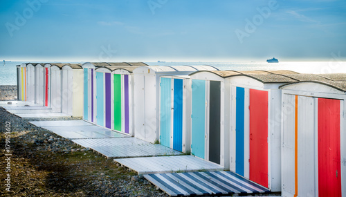 cabines, plage du Havre, navire cargo au loin, Seine Maritime, Normandie photo