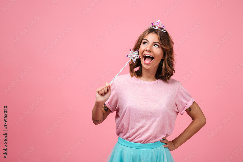 Portrait of a cheerful pretty girl dressed in fairy costume Portrait of a cheerful pretty girl dressed in fairy costume