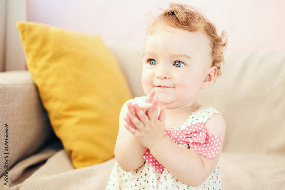 little girl claps her hands smiling little girl claps her hands smiling