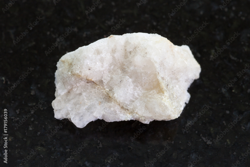 scheelite vein (tungsten ore) in rough stone scheelite vein (tungsten ore) in rough stone