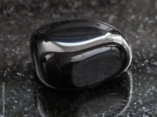 Obraz na płótnie polished black Onyx gemstone on dark