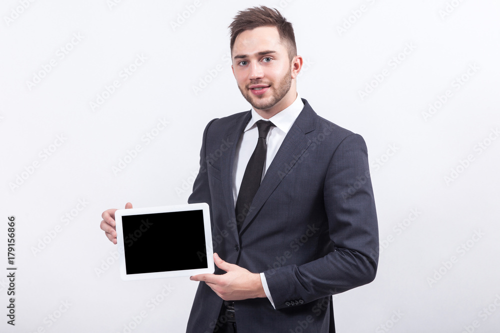 Picture of attractive businessman with tablet computer Picture of attractive businessman with tablet computer