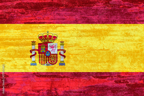 Spain Flag on wood texture background