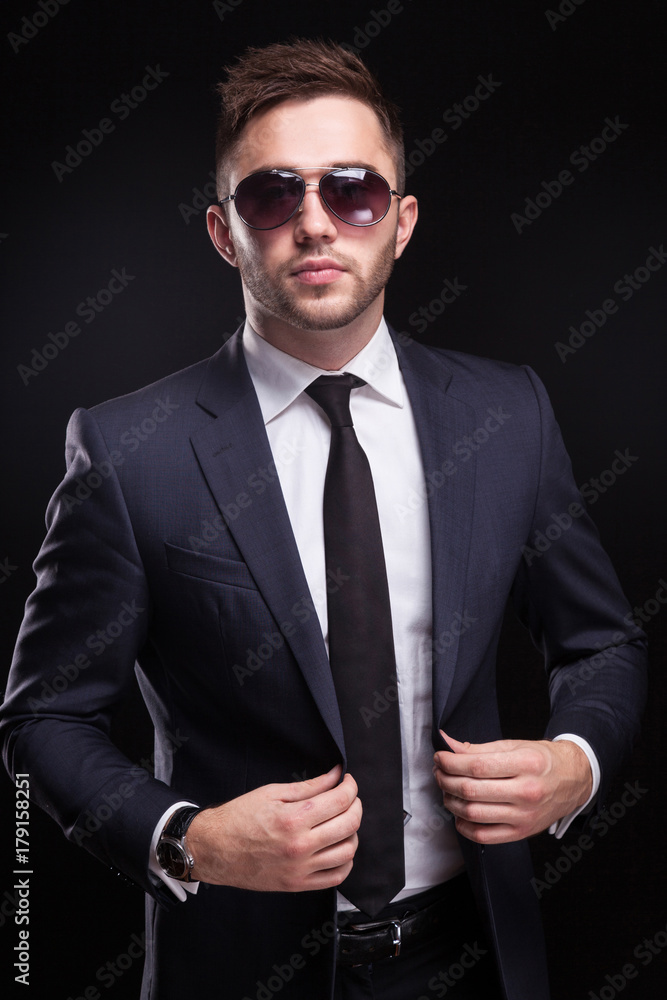 Picture of young businessman standing Picture of young businessman standing