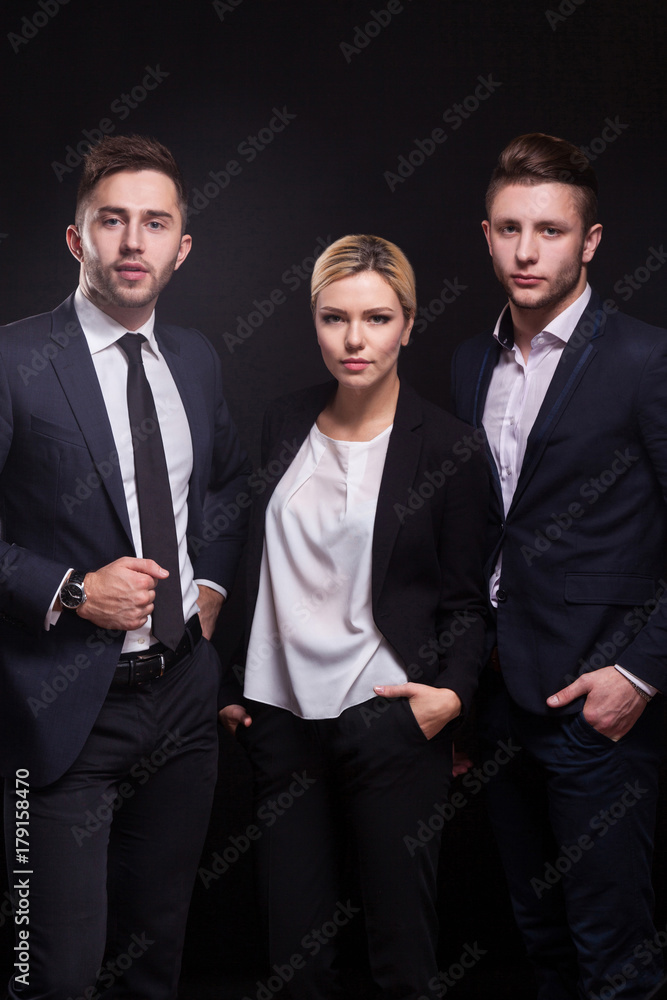 Picture of young trio of office workers standing Picture of young trio of office workers standing