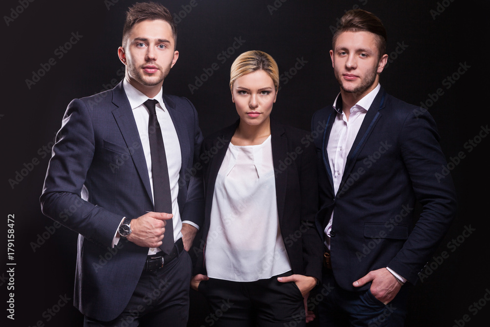 Picture of young trio of office workers standing Picture of young trio of office workers standing