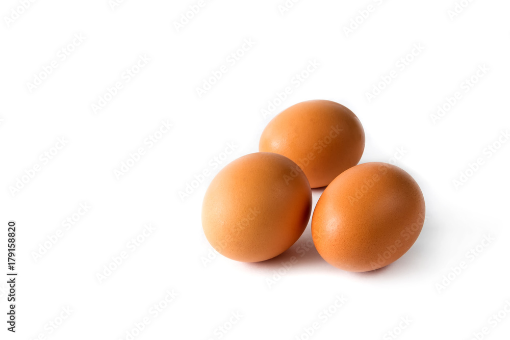 Chicken eggs brown close-up on white background isolate Chicken eggs brown close-up on white background isolate