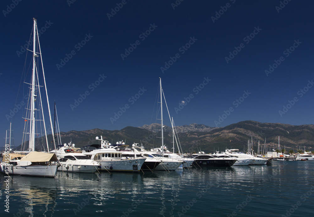 Luxury yachts in Porto Montenegro, prestigious shopping village and yacht port