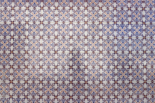 Brown-blue tile on a facade in Portugal