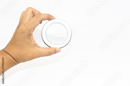 Hand's man holding transparent of metalic round lid