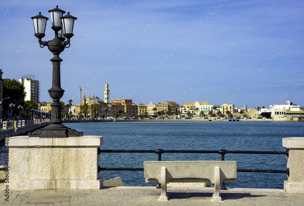 panoramic views of the waterfront of Bari, Puglia - Italy.In the foreground the characteristic lamppost