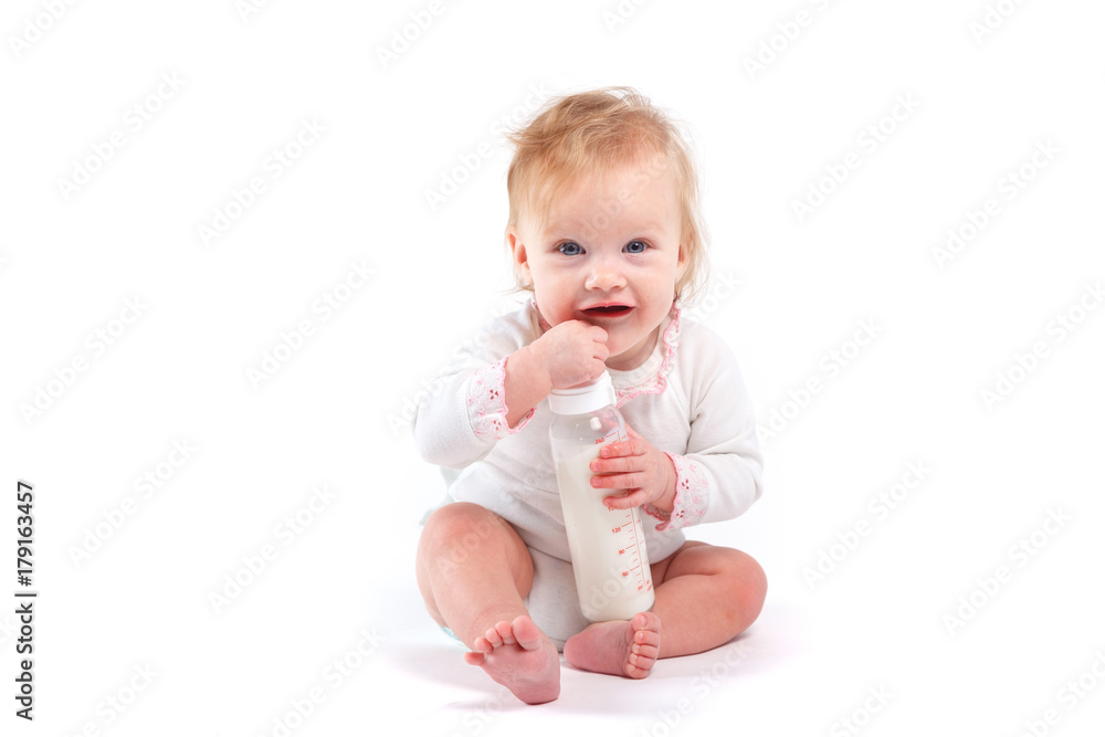 cute cheerful little girl in white dress and milk bottle cute cheerful little girl in white dress and milk bottle