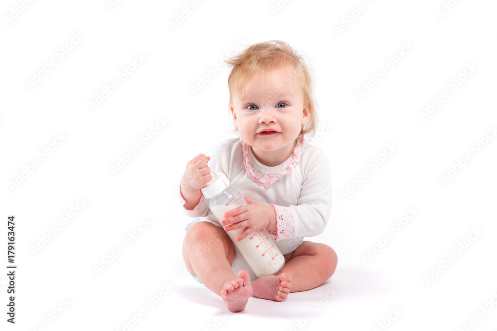 cute happy baby girl in white shirt hold bottle cute happy baby girl in white shirt hold bottle