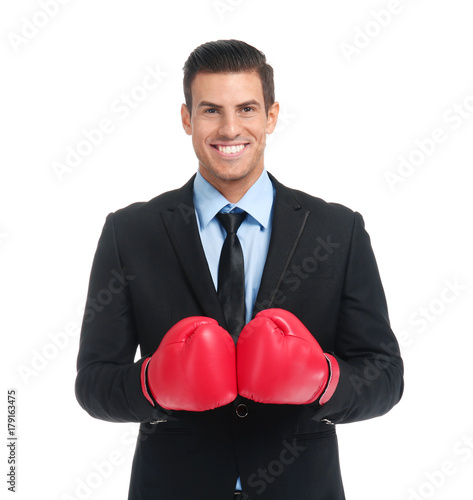 Businessman in boxing gloves on white background © Africa Studio