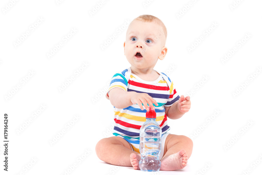 cute amazed little boy in colorful shirt with milk cute amazed little boy in colorful shirt with milk