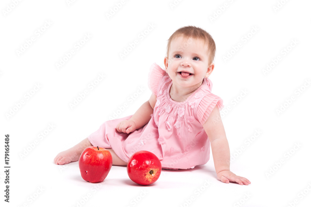 cute cheerful little girl in dress with apples cute cheerful little girl in dress with apples