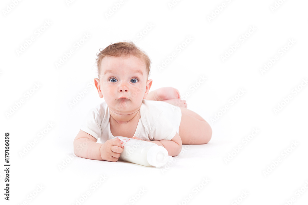 cute cheerful little boy in white shirt with bottle cute cheerful little boy in white shirt with bottle