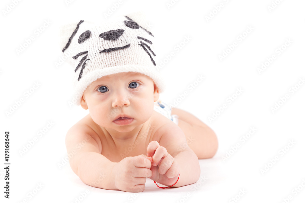 cute little boy in white diaper and cat hat