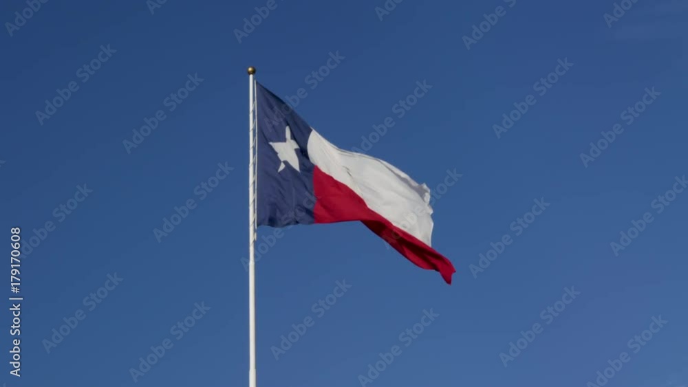Texas Flag over a Blue Sky Texas Flag over a Blue Sky
