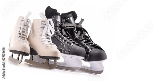 Canvas Print Ice hockey skates and figure skates isolated on white