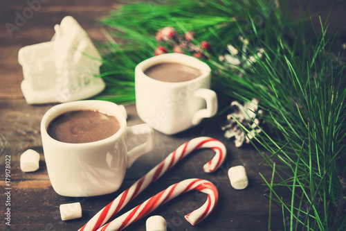 Toned photo Christmas or New Year concept with two hot drinks and decoration