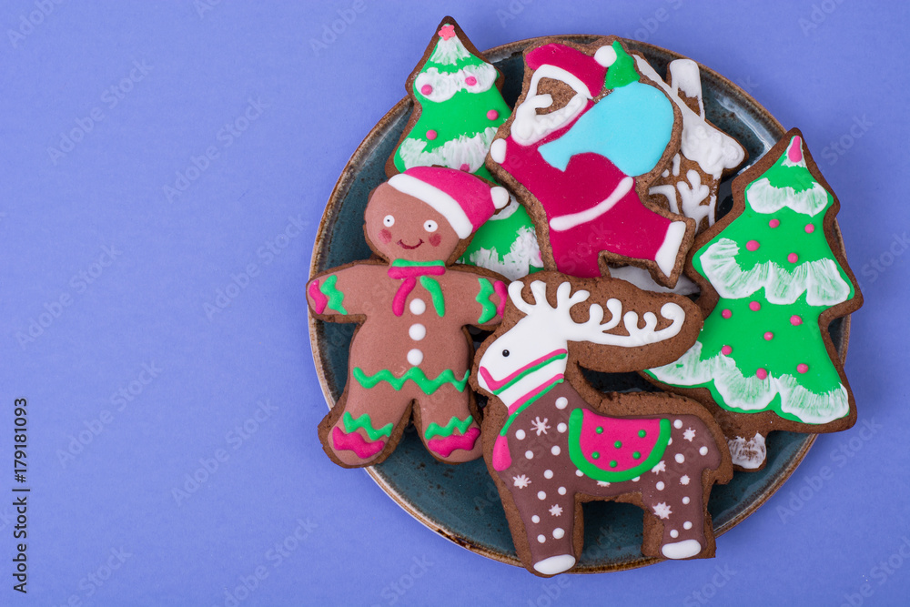Beautiful and tasty Christmas pastries on bright background