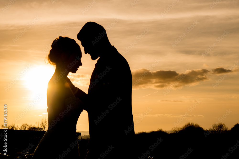 silhouetted wedding moment