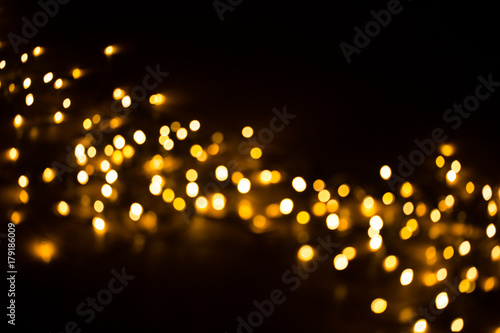 Christmas background with light spots and bokeh.