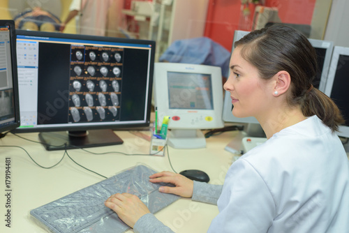 radiologist monitoring the screen