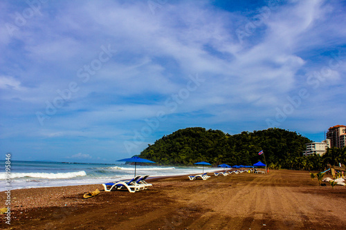 The sunshade, a set of beach umbrellas being rented at Jaco, Costa Rica. This was taken on Aug 18, 2014. © Karen