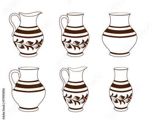 Set of ceramic crockery in brown and white colors. 