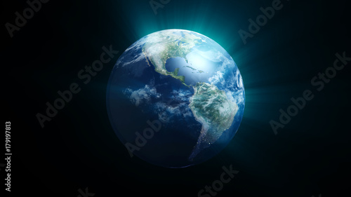 Planet earth with shine effect on black background. 3d rendering © turbomotion046