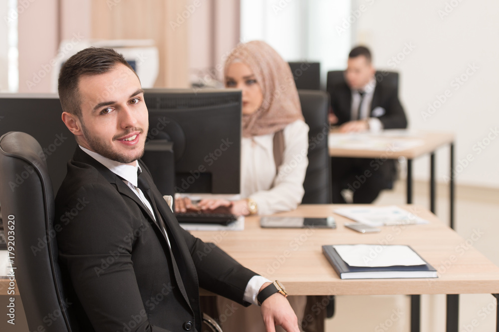 Businesswoman And Businessman Looking At Computer Businesswoman And Businessman Looking At Computer
