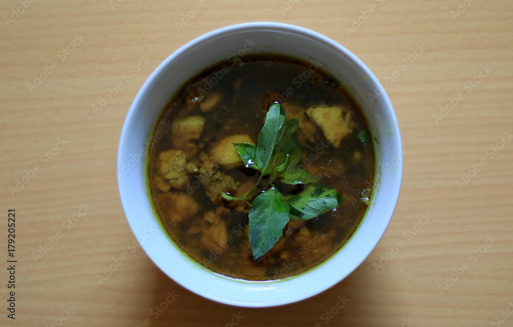 Rawon. Traditional Indonesian beef black soup, originally from Surabaya. Served with steam rice, salted egg, bean sprouts & chili sauce. Rawon. Traditional Indonesian beef black soup, originally from Surabaya. Served with steam rice, salted egg, bean sprouts & chili sauce.