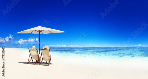Couple relaxing at a beach in Samoa