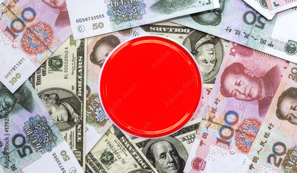 Dollar banknote and yuan banknote on the table. Dollar banknote and yuan banknote on the table.