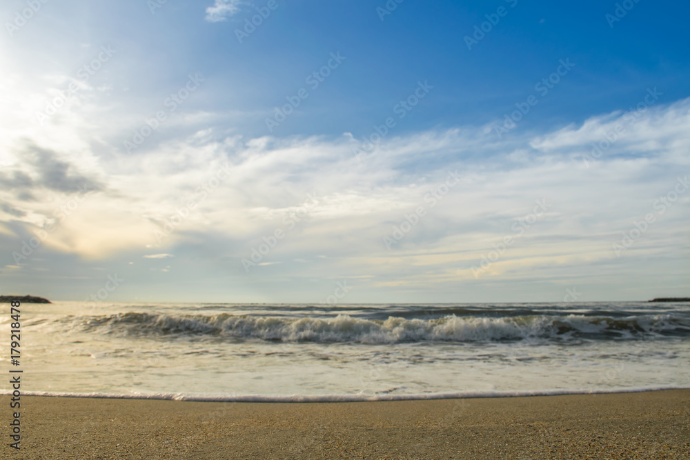 sunset and wave bubble seascape and blue sky on the beach