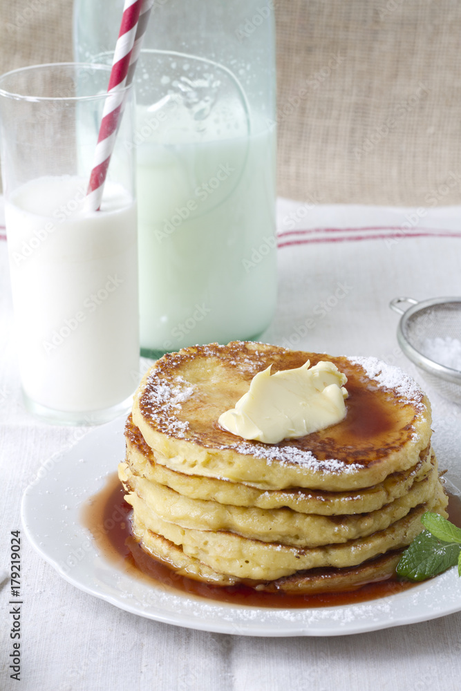 Pancakes with butter and maple syrup Pancakes with butter and maple syrup