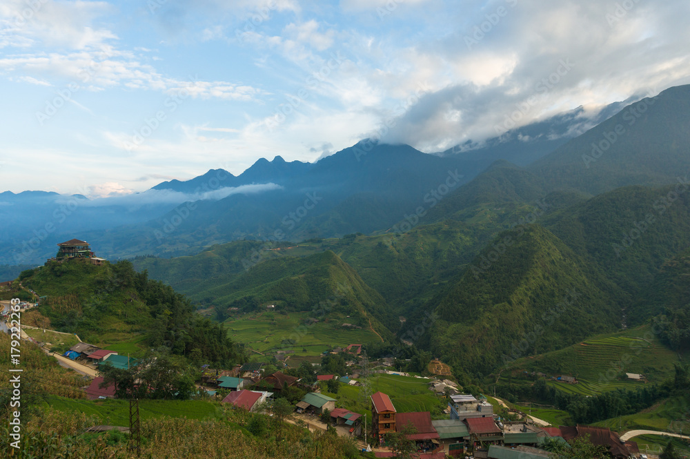 Aerial view on mountain range valley village