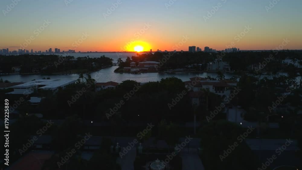 Aerial hyperlapse Miami sunset waterfront mansions
