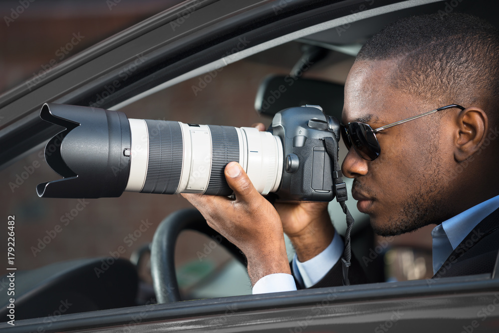 Detective Sitting Inside Car Photographing Detective Sitting Inside Car Photographing